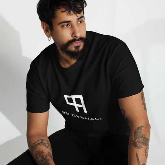 Man in the black 99 Overall Logo Heavyweight Tee, editorial close-up